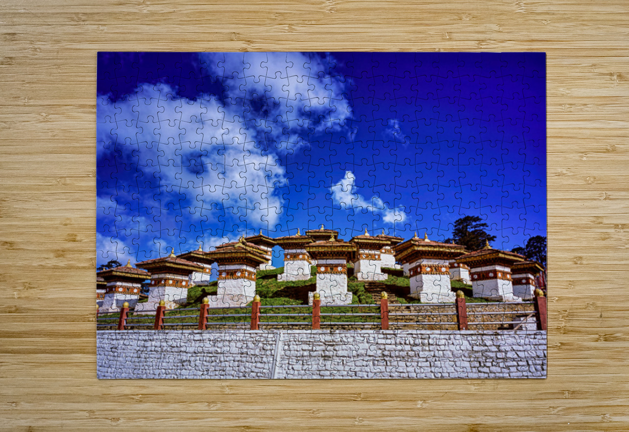 Traditional Bhutanese chortens on a green hill blue sky. Marco Brivio Puzzle printing