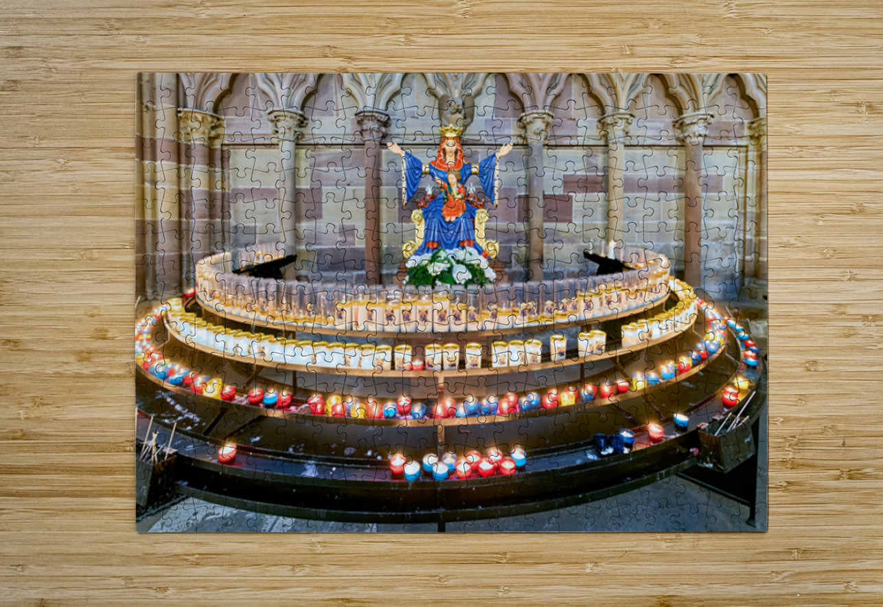 Visitors light votive candles near statue in Strasbourg Cathedra Marco Brivio Puzzle printing