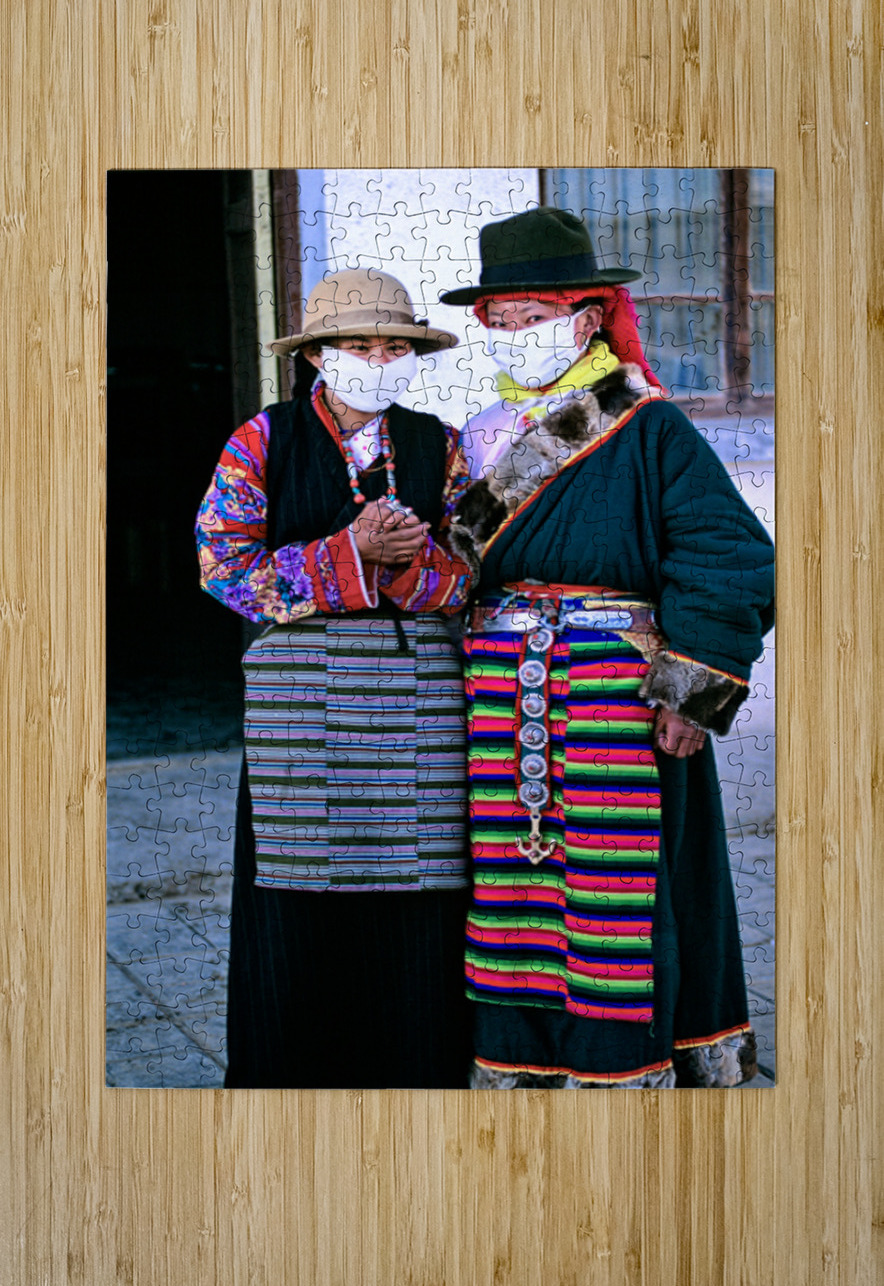 Masked individuals in traditional clothing hold hands in Tibet Marco Brivio Puzzle printing
