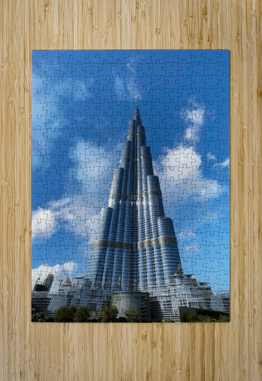 Burj Khalifa stands tall against a blue sky in Dubai UAE Marco Brivio Puzzle printing