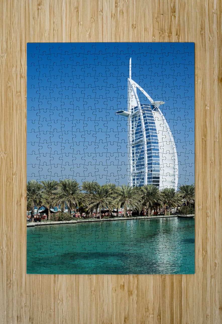 Burj Al Arab hotel stands tall by the water with palm trees Marco Brivio Puzzle printing
