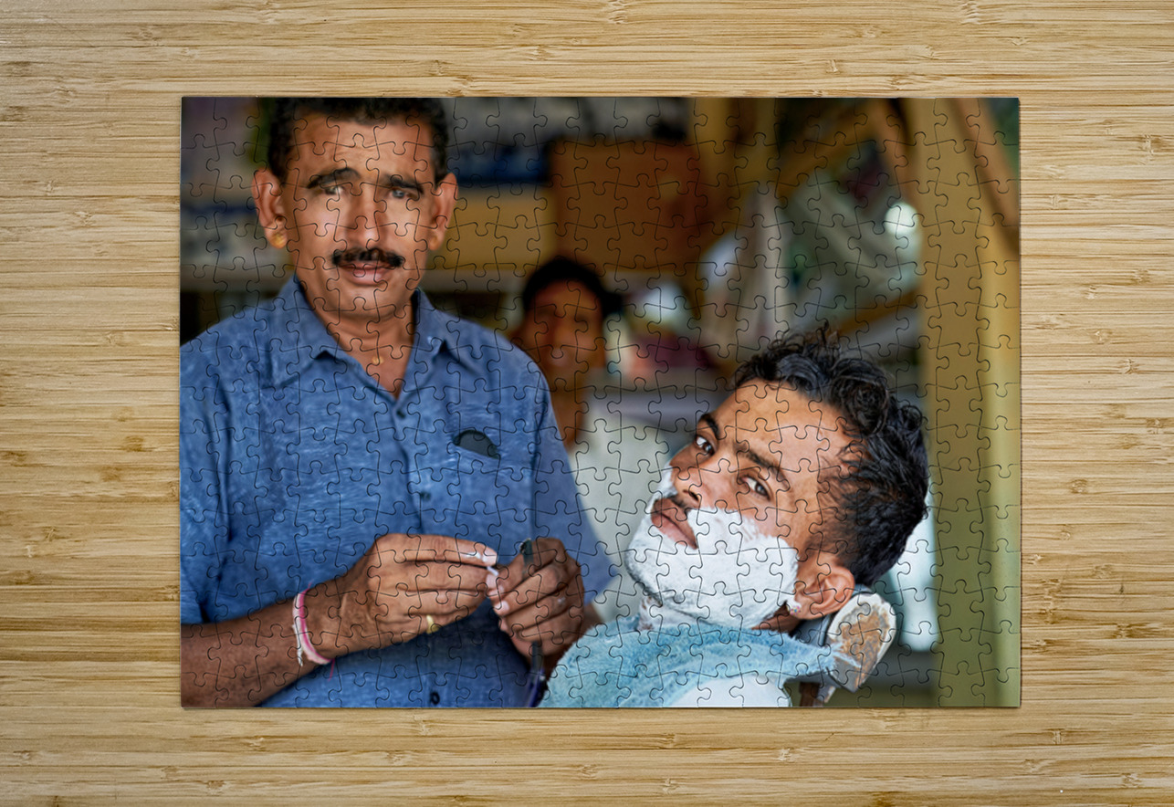 Barber at work in Khimsar Rajasthan India during a busy day Marco Brivio Puzzle printing