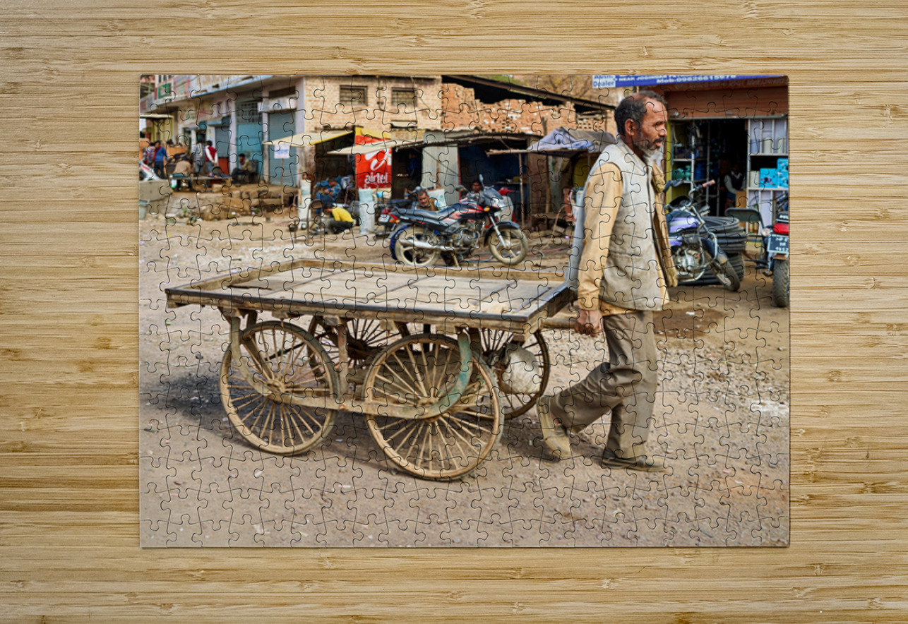 Man pulls an empty cart in Orchha Madhya Pradesh India Marco Brivio Puzzle printing