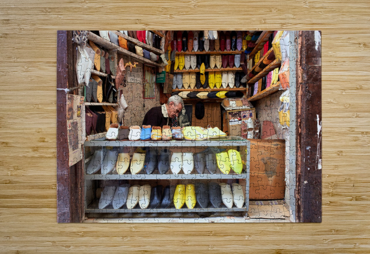 Moroccan babouches shoes in a Fez shop with a vendor Marco Brivio Puzzle printing