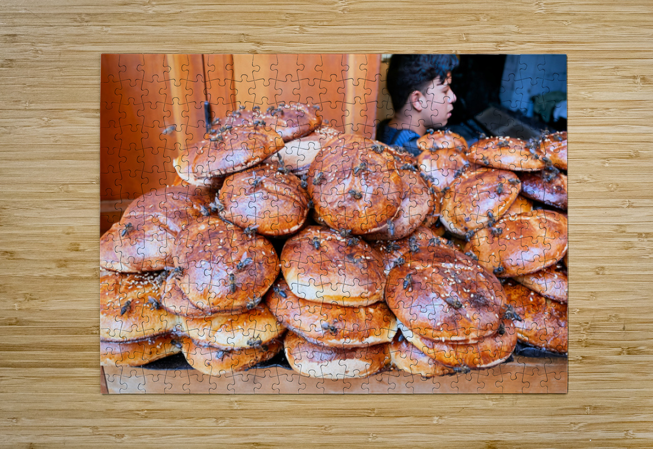 Loaf of bread covered in flies at market in Fez Morocco Marco Brivio Puzzle printing