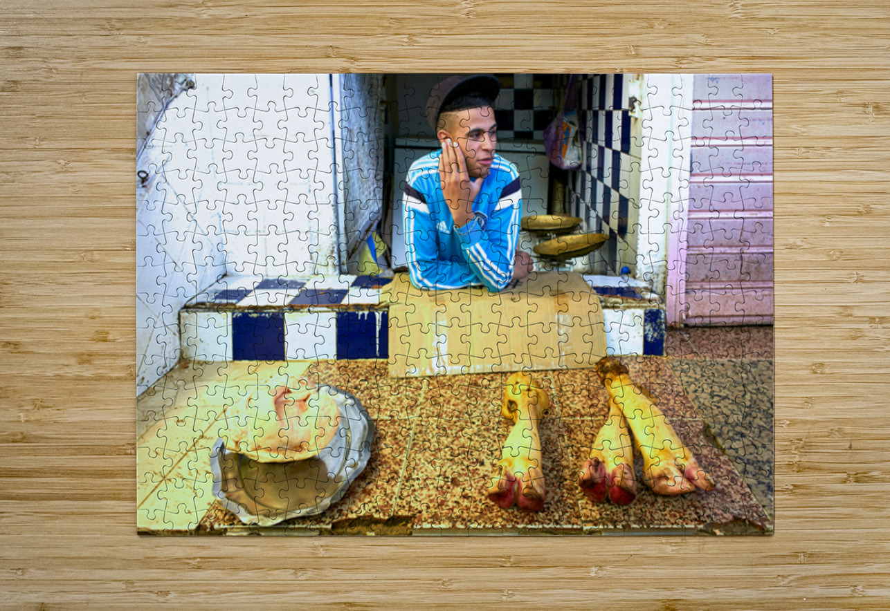 Butcher in Meknes souk interacts with customers during market ho Marco Brivio Puzzle printing