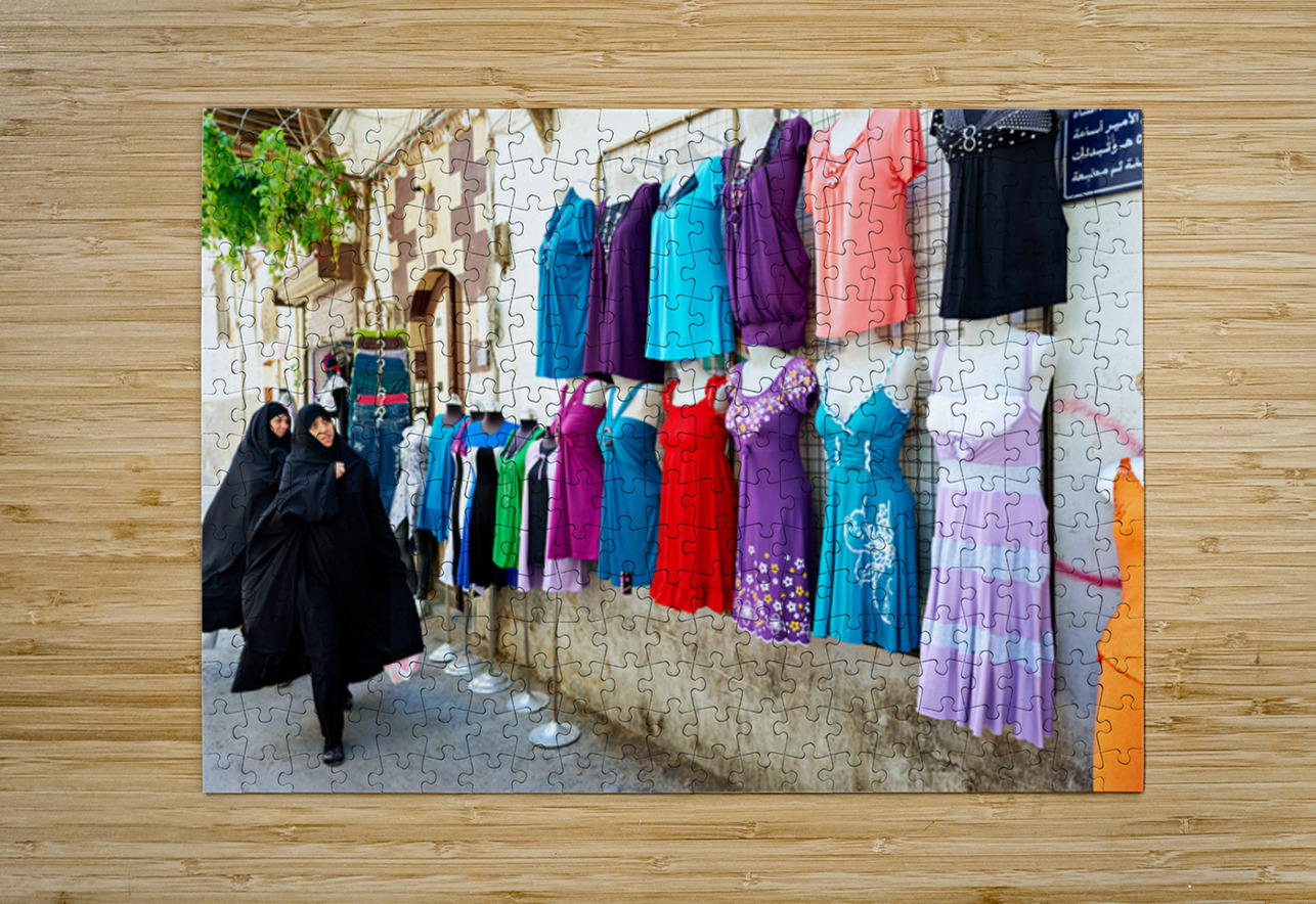 Women walk past colorful clothing displays in Damascus Syria Marco Brivio Puzzle printing