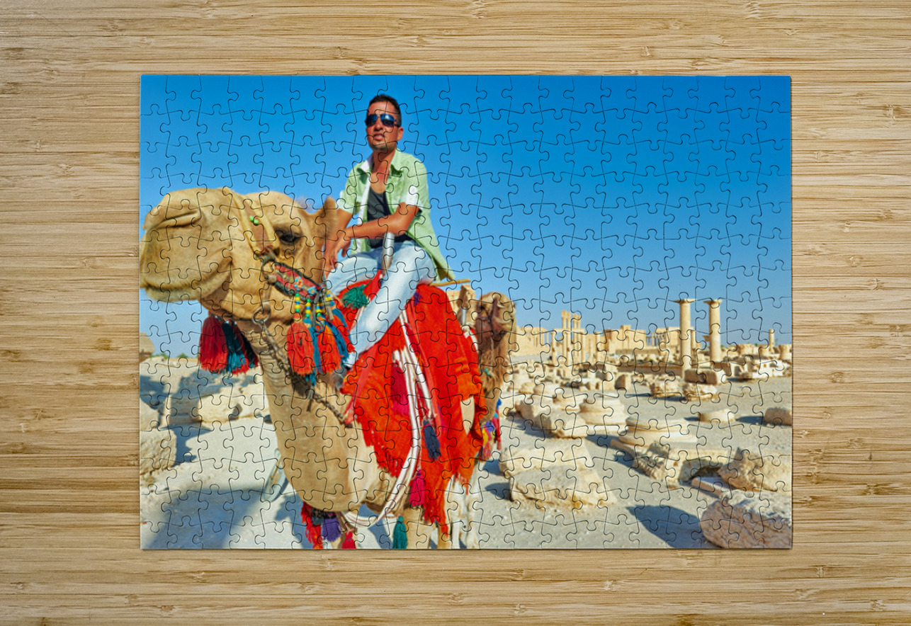 Camel driver in ancient Palmyra leading a tourist ride Marco Brivio Puzzle printing