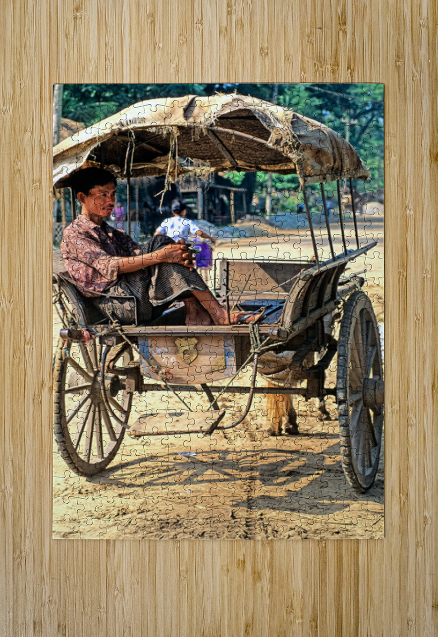 Man rests on cart in Myanmar during warm daytime Marco Brivio Puzzle printing