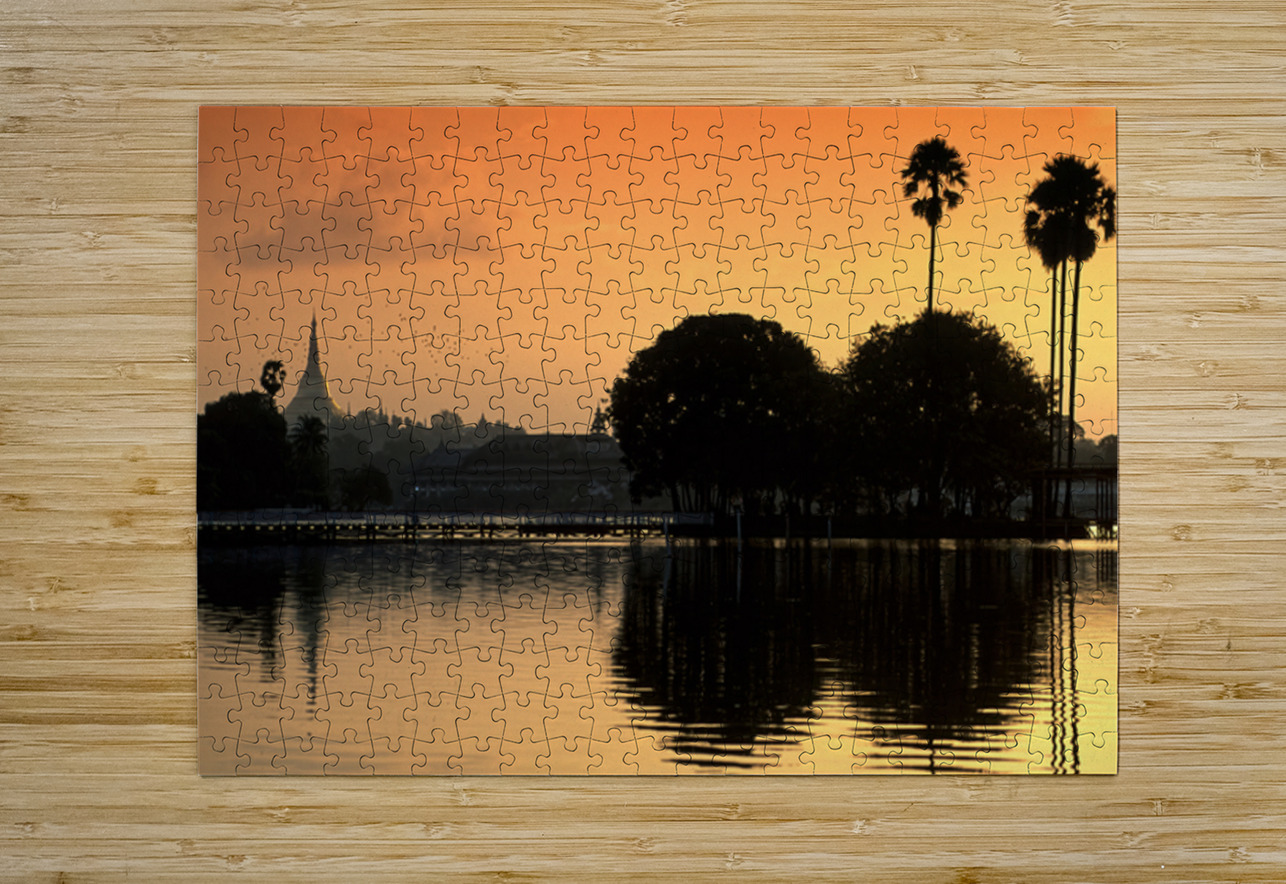 Sunset over the water in Yangon with palm trees and buildings Marco Brivio Puzzle printing