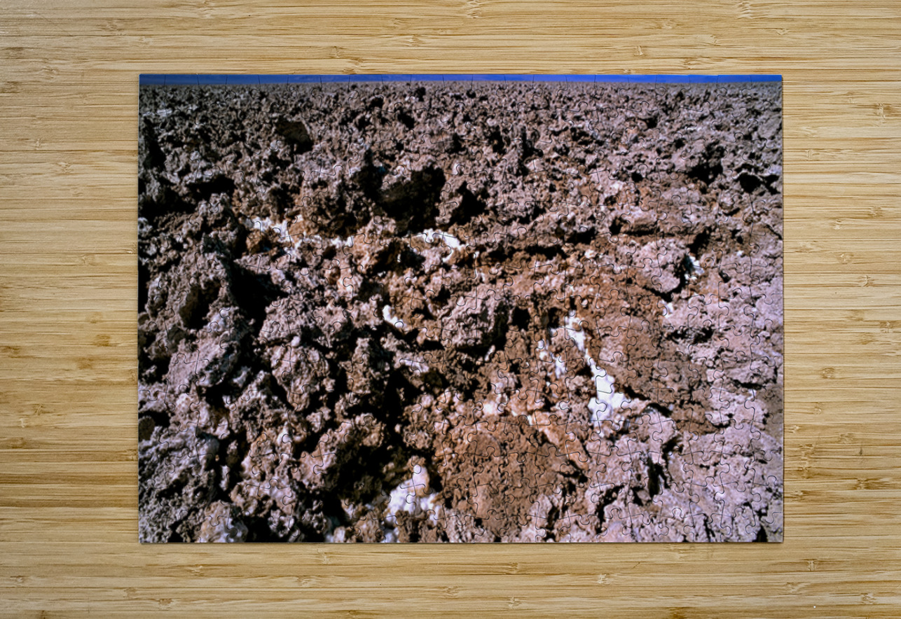 Salt encrusted desert floor under a bright blue sky. Marco Brivio Puzzle printing