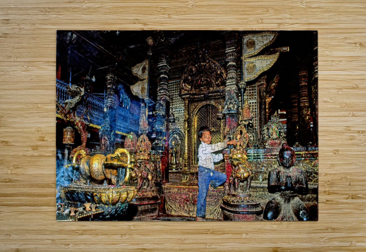 Boy interacts with religious artifacts in Kathmandu temple Marco Brivio Puzzle printing