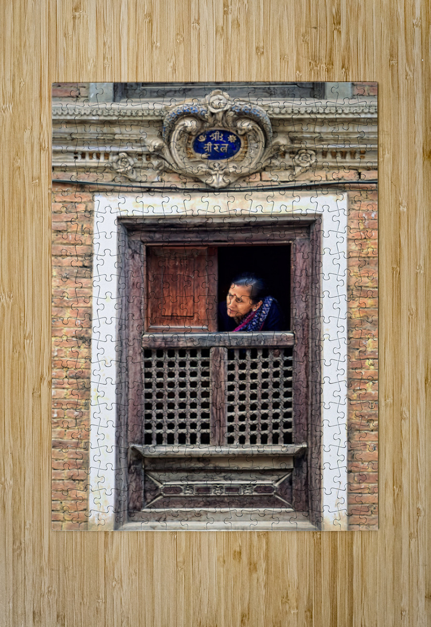 Woman in Kathmandu looks out from window in old building Marco Brivio Puzzle printing