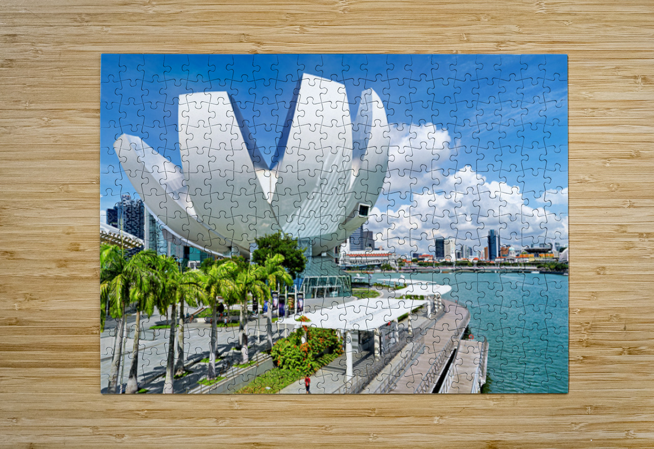 Visitors enjoy view of ArtScience Museum in Singapore near water Marco Brivio Puzzle printing
