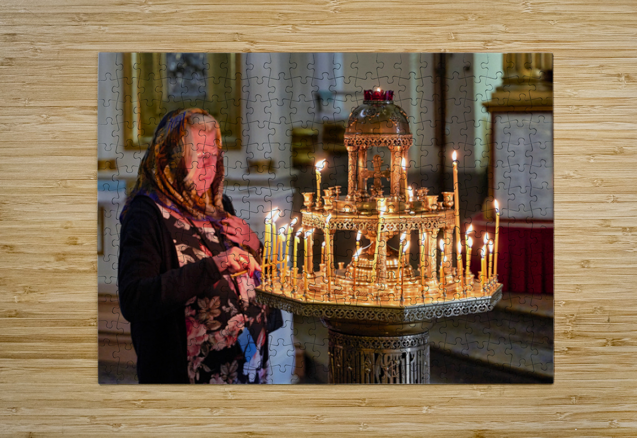Woman lights candles at Alexander Nevsky Lavra Marco Brivio Puzzle printing