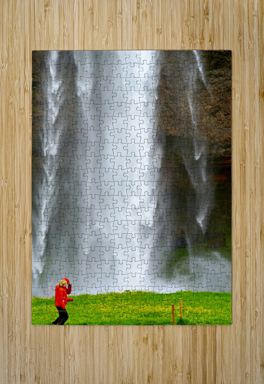 Woman walks near Seljalandsfoss waterfall in Iceland Marco Brivio Puzzle printing