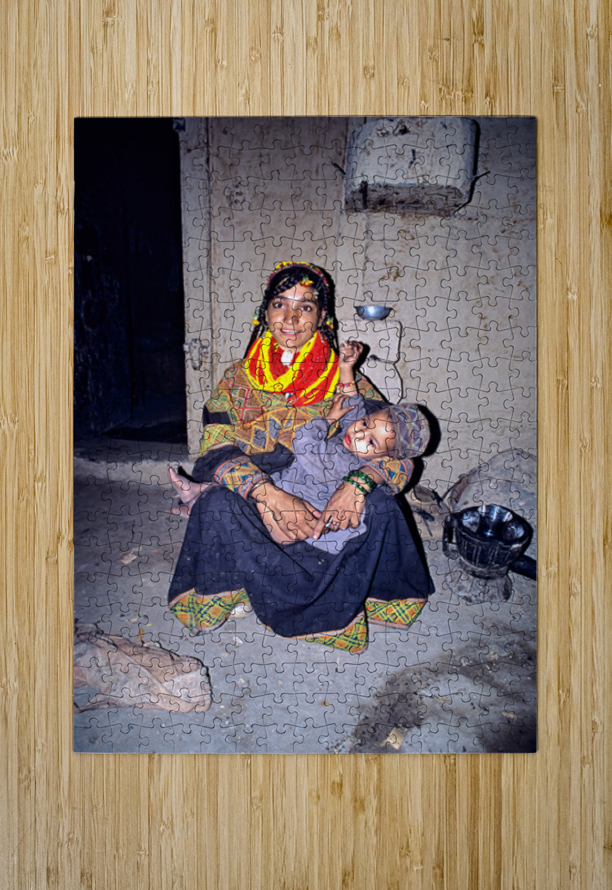 A woman holds her child in a Kalash village Marco Brivio Puzzle printing