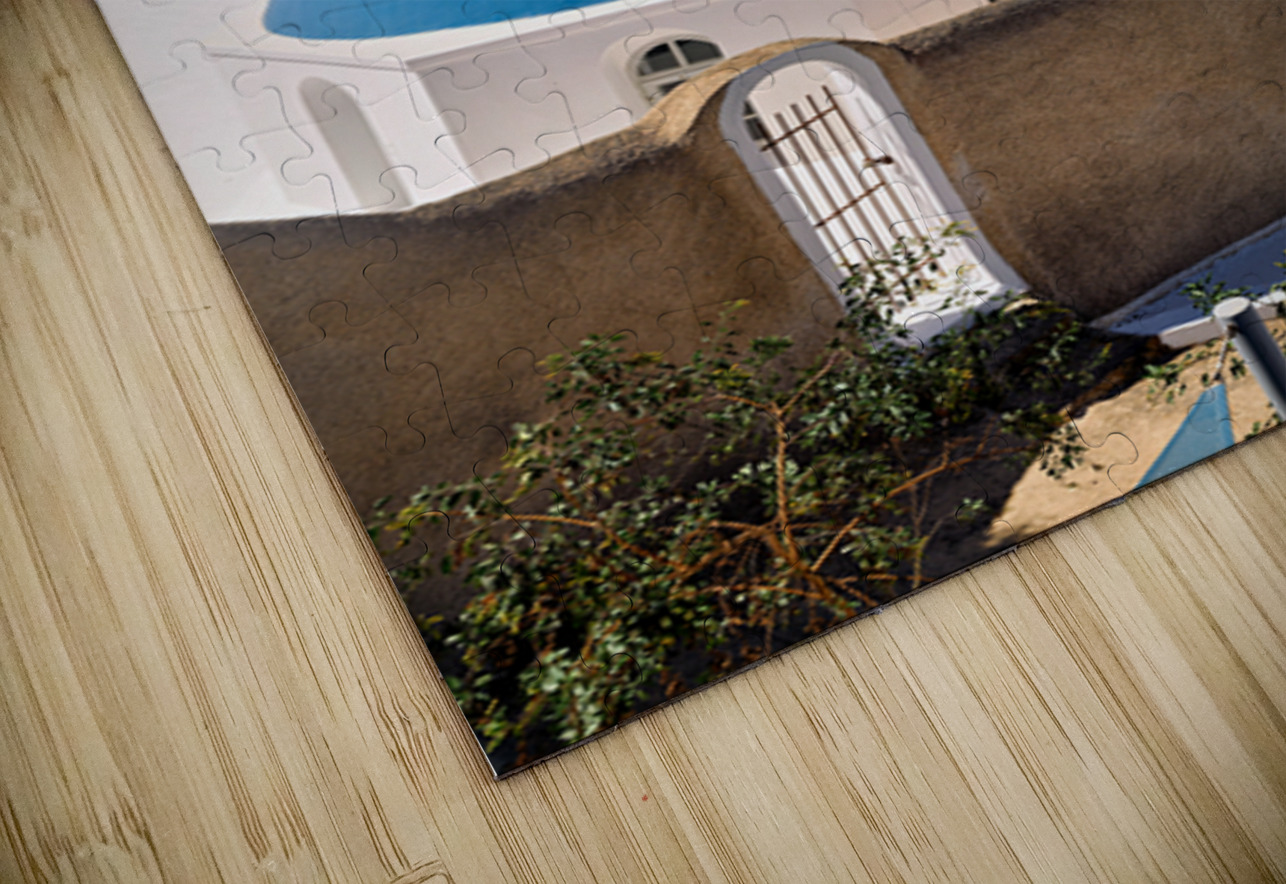 Santorinis iconic blue dome church and caldera seascape. Marco Brivio Puzzle