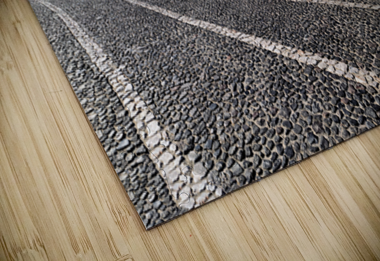 Beautiful white church and cobblestone street in sunny Santorini Marco Brivio Puzzle