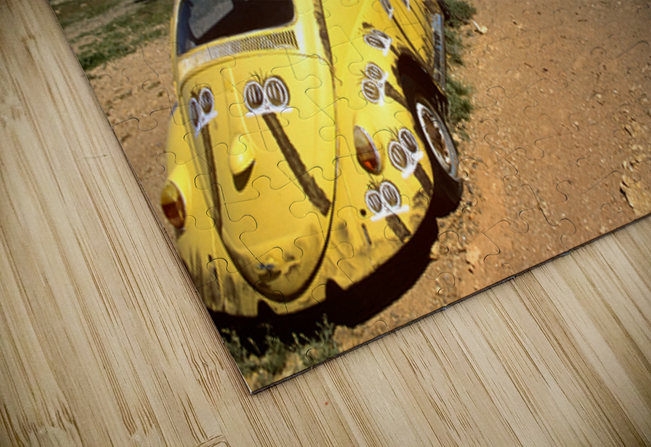 A painted yellow Beetle outside a rural stone gallery. Marco Brivio Puzzle