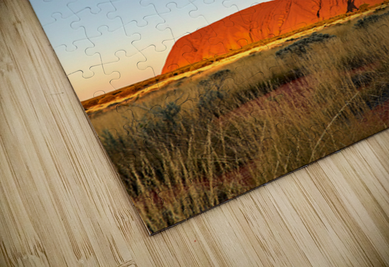 Uluru bathed in golden sunset light Australia. Marco Brivio Puzzle
