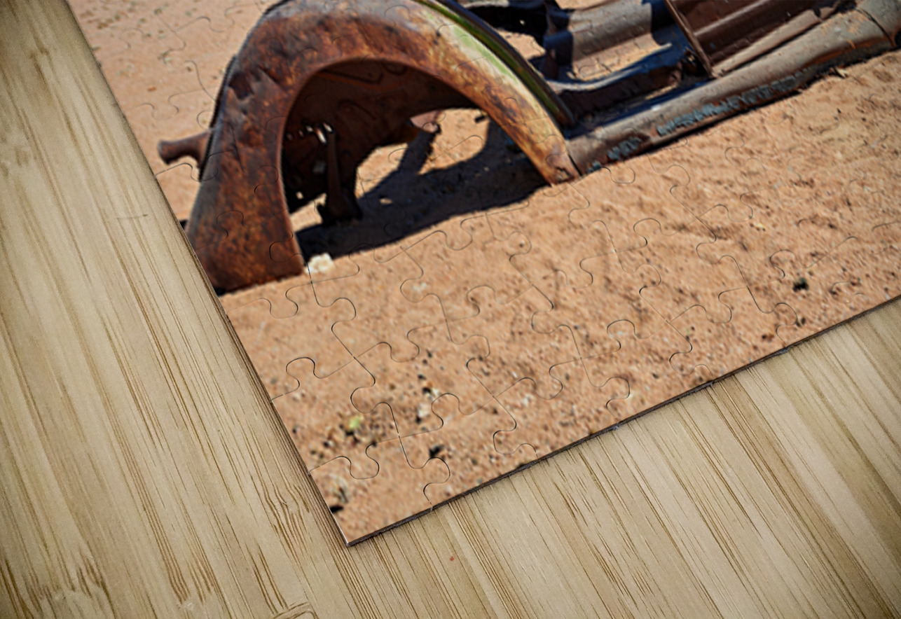 Classic car wreck rests in the Namib desert under a clear sky Marco Brivio Puzzle