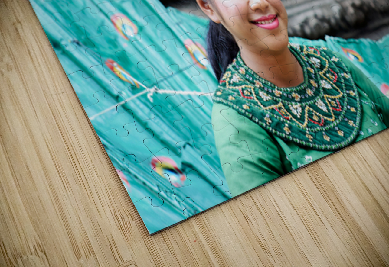 Smiling Cambodian dancer in traditional peacock costume at templ Marco Brivio Puzzle
