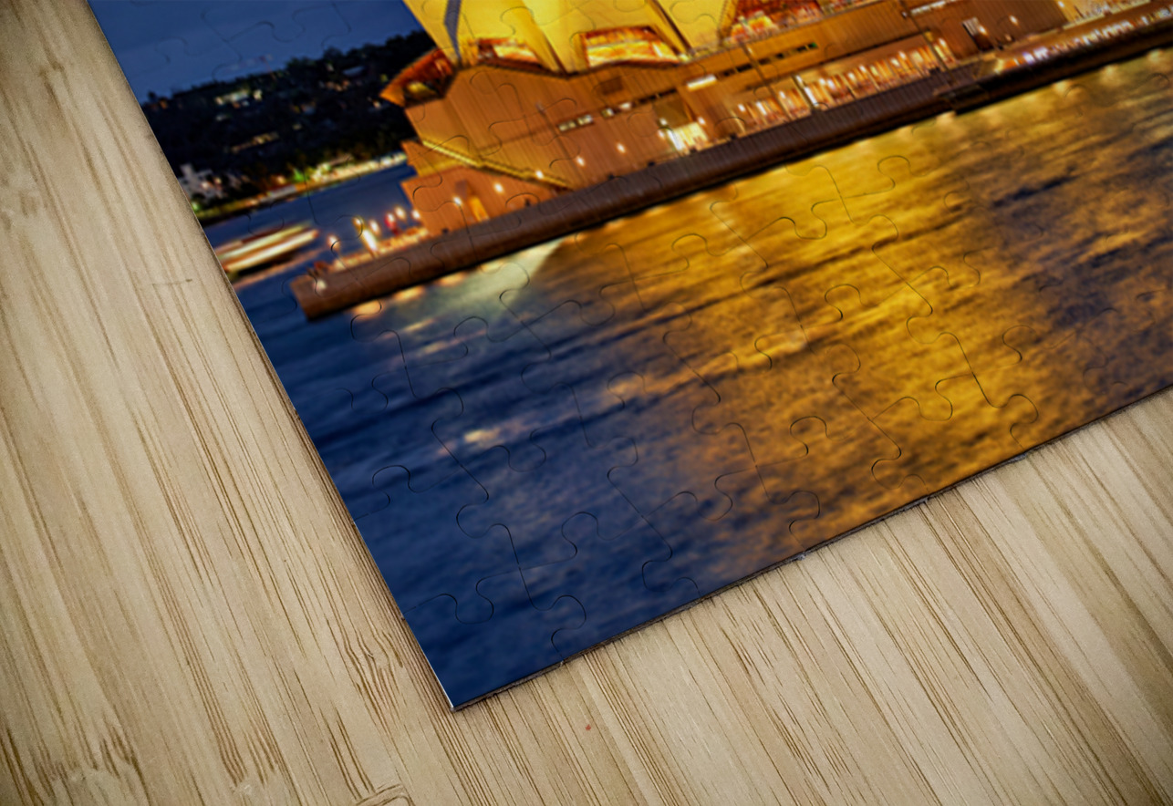 Sydney Opera House illuminated at dusk with harbor lights. Marco Brivio Puzzle
