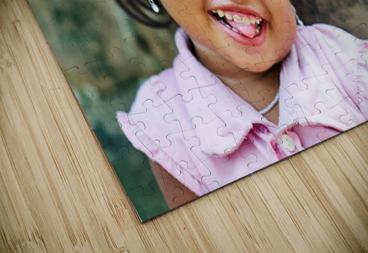 Joyful young girl with a playful smile and tongue out. Marco Brivio Puzzle