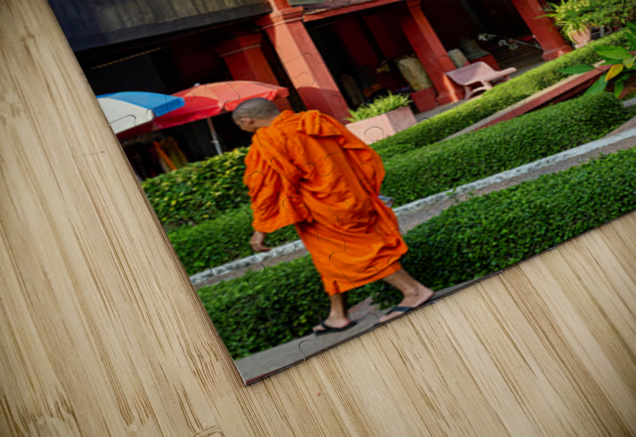 Monk walks through traditional Cambodian temple garden. Marco Brivio Puzzle
