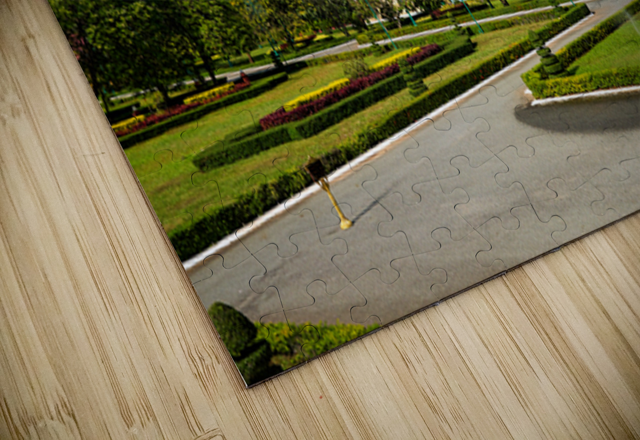 Golden roofed palace in lush gardens Phnom Penh Cambodia. Marco Brivio Puzzle