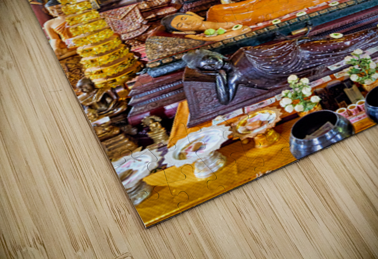 Golden Buddha statues and offerings in an ornate temple. Marco Brivio Puzzle