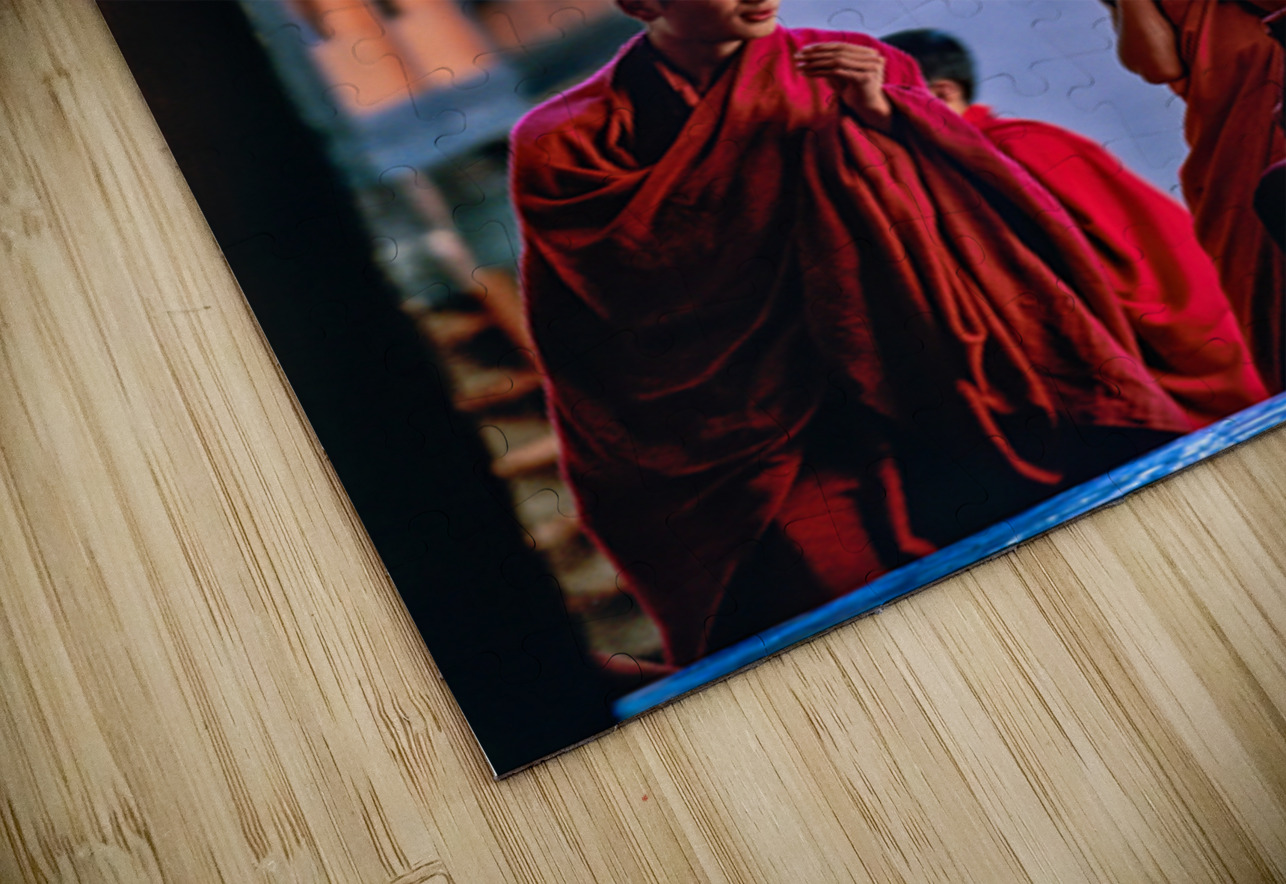 Bhutanese monks using a mobile phone. Marco Brivio Puzzle
