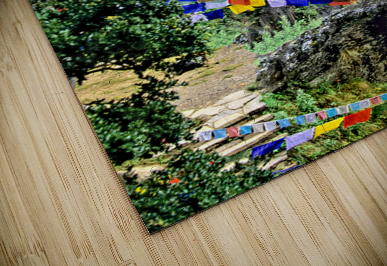 Iconic Bhutanese monastery on a cliff surrounded by prayer flag Marco Brivio Puzzle