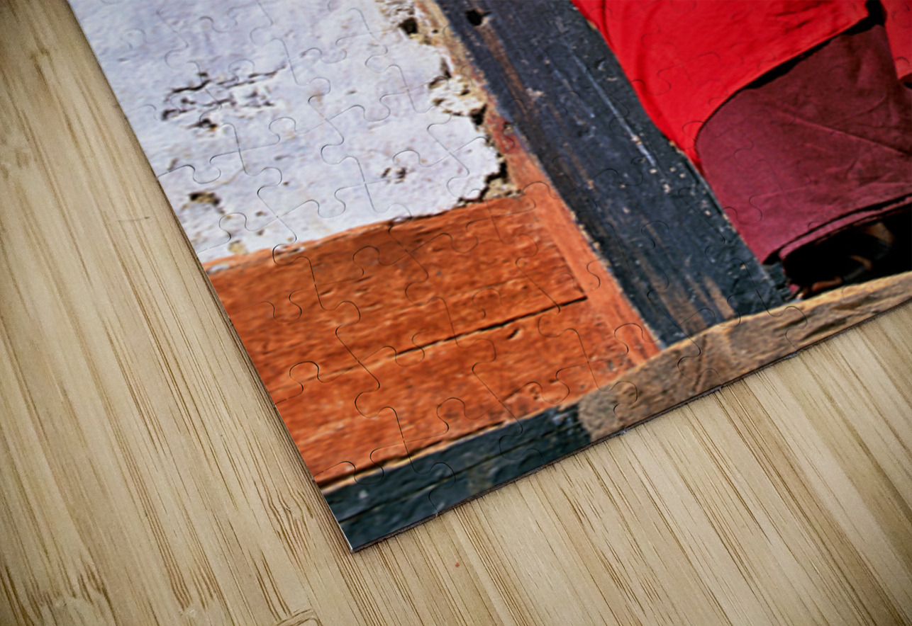 Monk in red robes on cell phone. Marco Brivio Puzzle