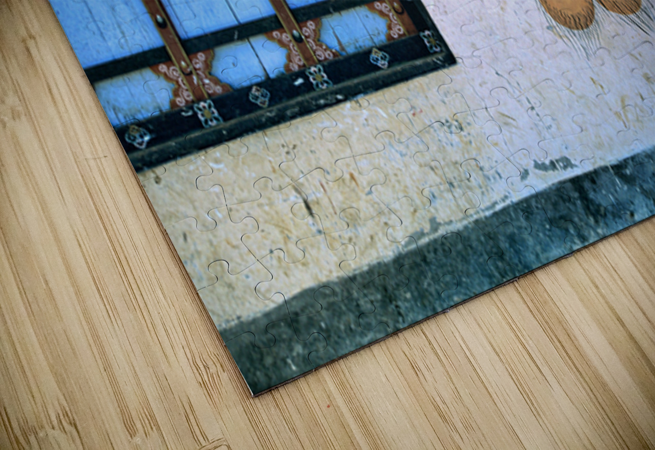 Phallus painting on a building wall with windows and shop sign. Marco Brivio Puzzle