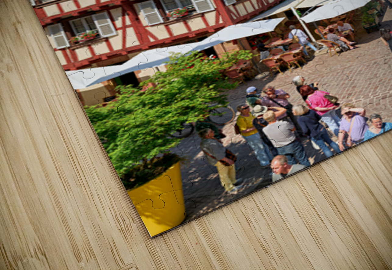 Visitors walk through Colmar on sunny day near timber framed hou Marco Brivio Puzzle