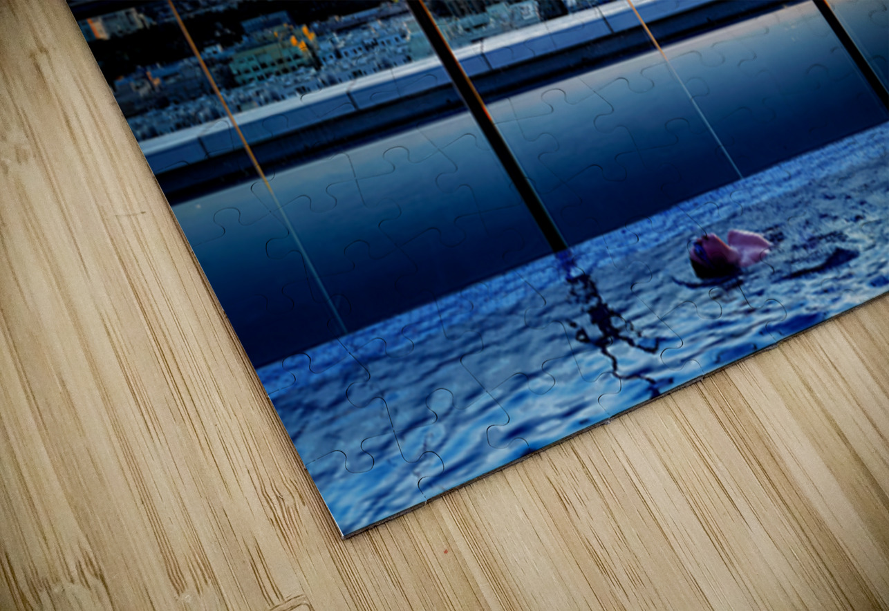 Swimming in infinity pool overlooking Dubai skyline at sunset Marco Brivio Puzzle