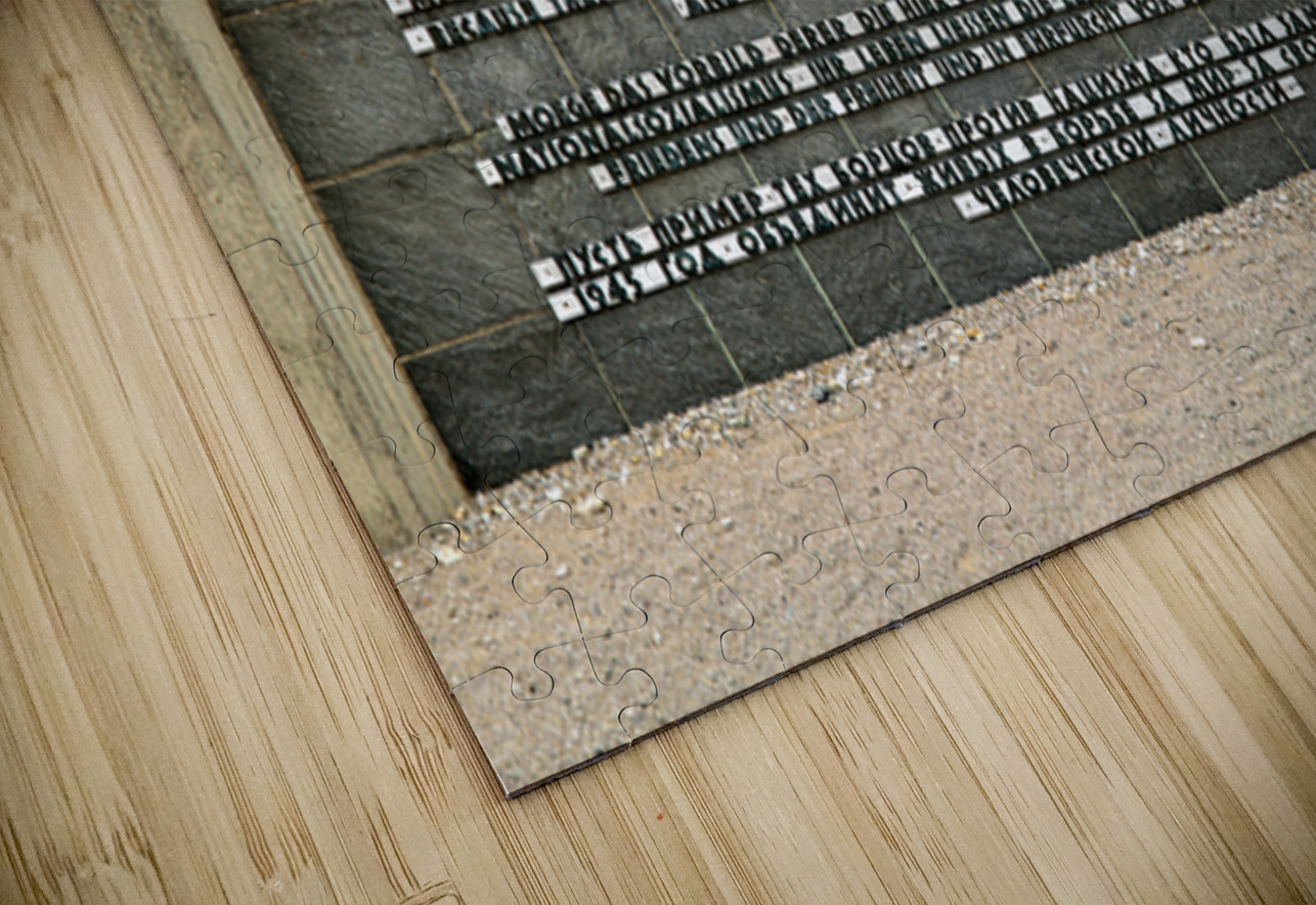 Memorial wall at Dachau concentration camp in Munich Germany Marco Brivio Puzzle