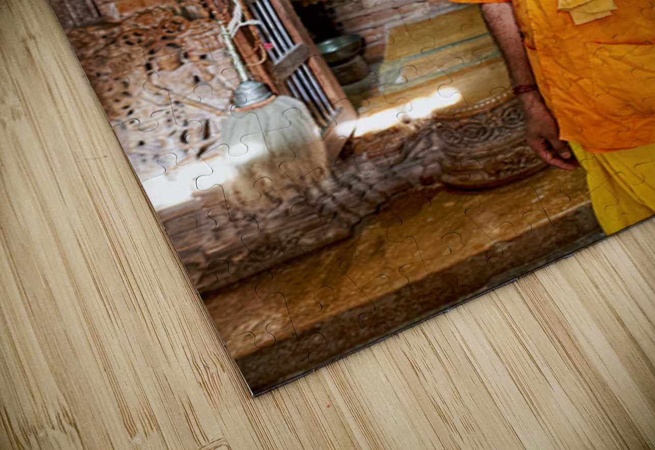 Hindu monk stands near statue in Jaisalmer Jain temple Marco Brivio Puzzle
