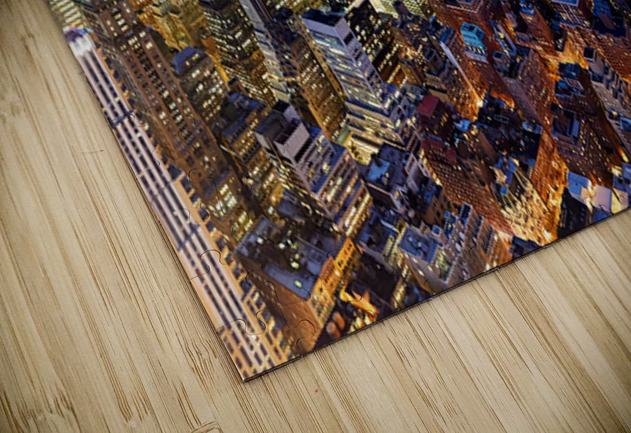 Aerial view shows Manhattan skyline at dusk with city lights Marco Brivio Puzzle