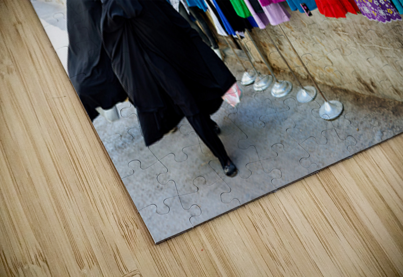 Women walk past colorful clothing displays in Damascus Syria Marco Brivio Puzzle