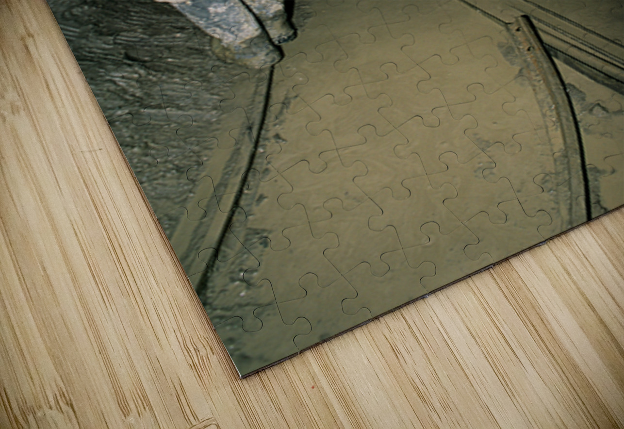 Miners pushing a loaded cart through a muddy underground mine. Marco Brivio Puzzle