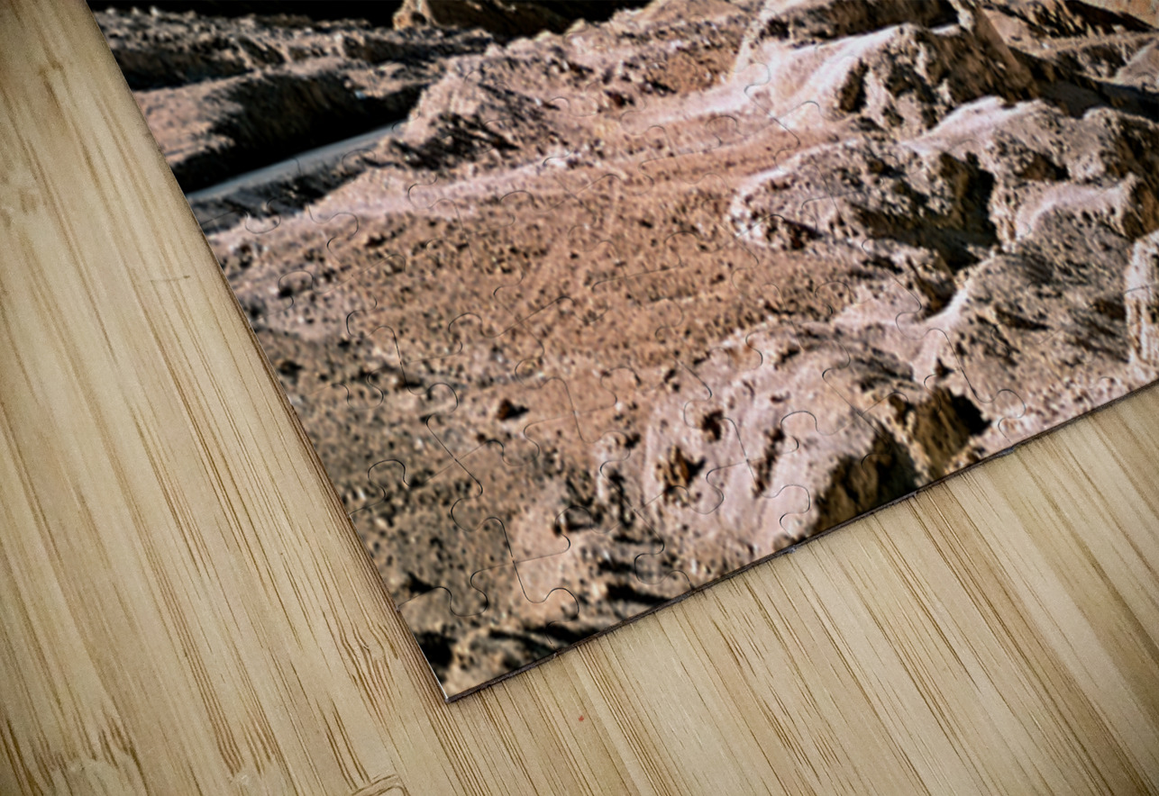 Eroded desert landscape with a road winding through mountains. Marco Brivio Puzzle