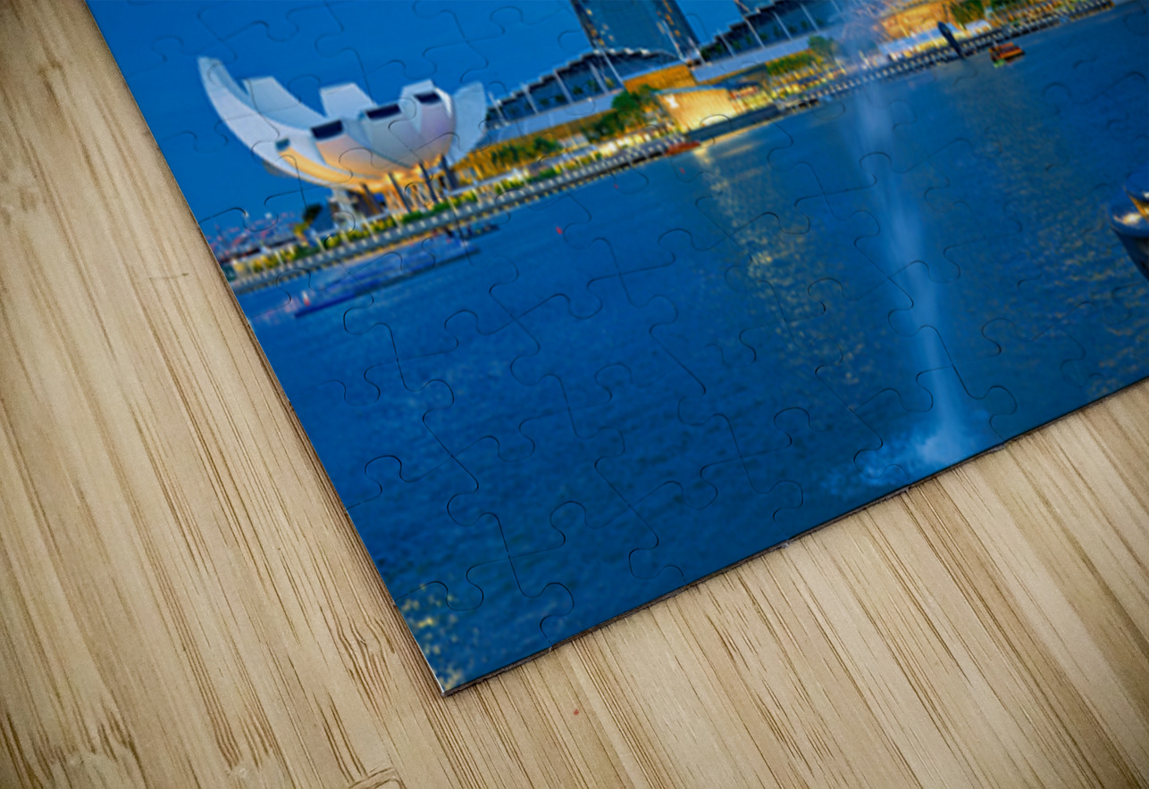 Visitors watch the Merlion fountain at Marina Bay during sunset Marco Brivio Puzzle