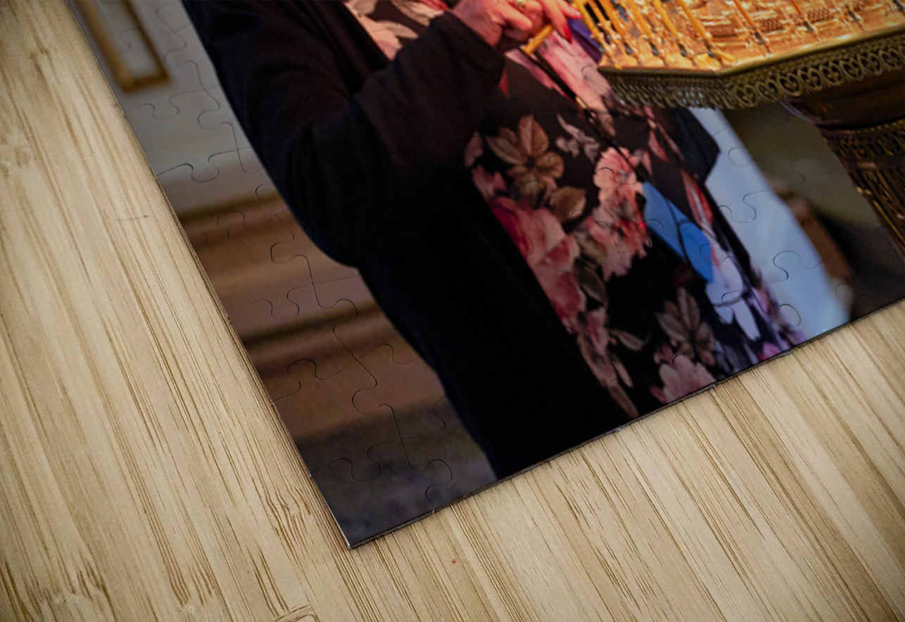 Woman lights candles at Alexander Nevsky Lavra Marco Brivio Puzzle