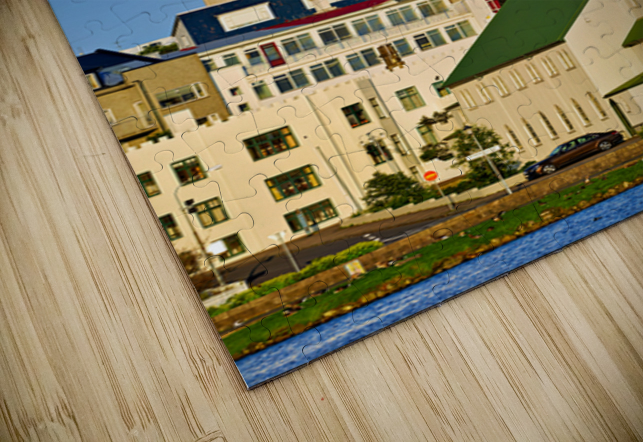 Lutheran free church by lake Tjornin and Halgrimskirkja Marco Brivio Puzzle