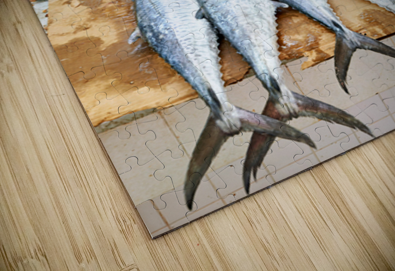 Fish seller prepares catch at Nizwa Oman fish market Marco Brivio Puzzle