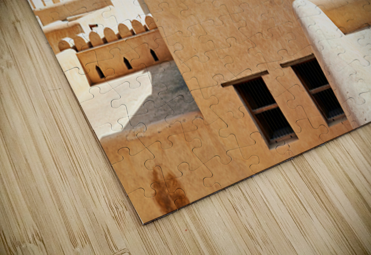 Visitors explore Nizwa Fort a historic site in Oman Marco Brivio Puzzle