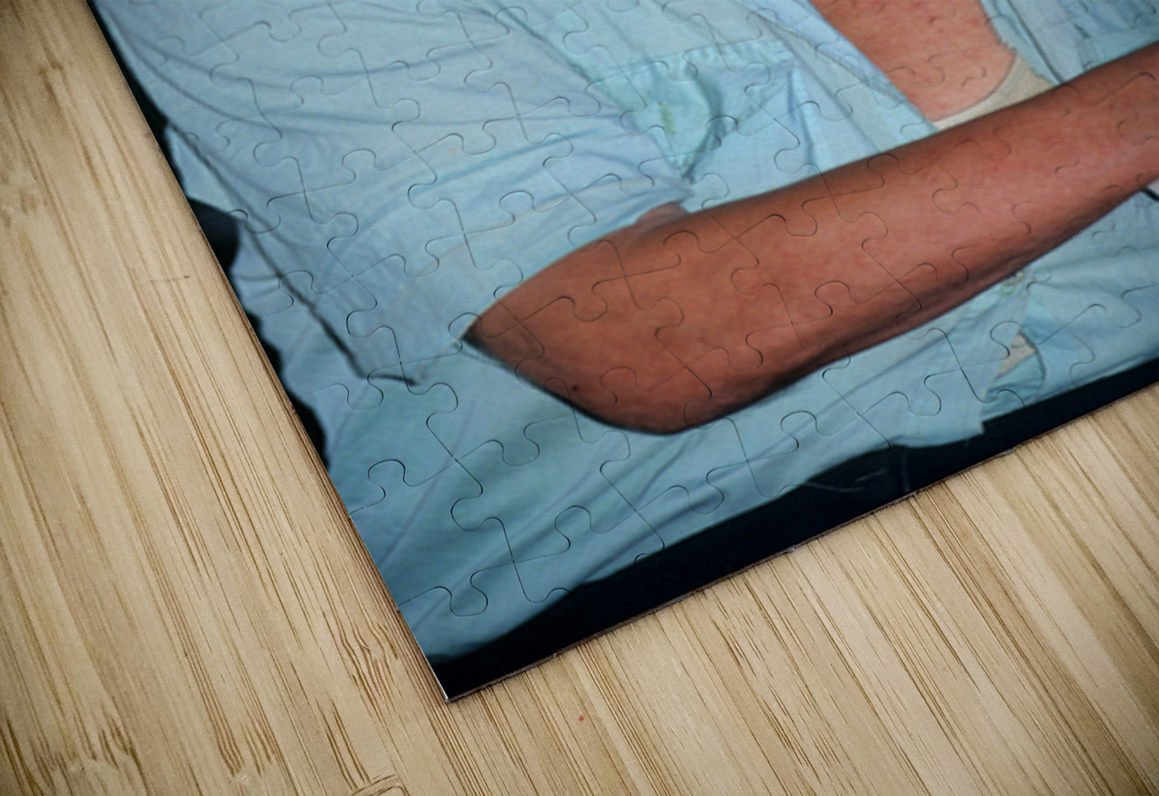 Elderly man smiles while sitting outdoors in Bukhara Uzbekistan Marco Brivio Puzzle